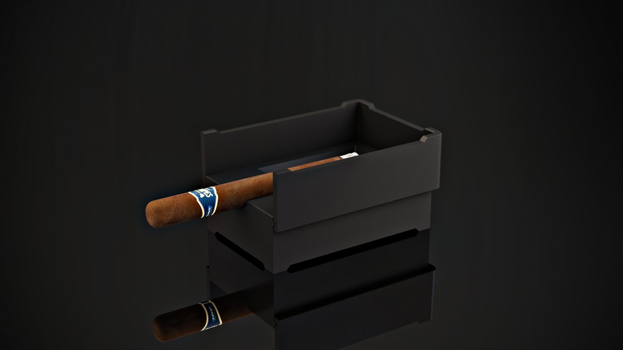 Fortress in black with the wind guard raised, reflected on a dark surface